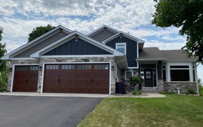 New Siding Project in Rogers Using Expert Finish Lap Siding and Board & Batten from Natural Stone & LP Smartside